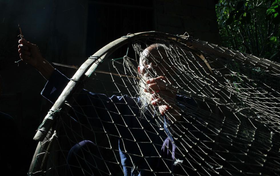 桂林八旬“漁翁兄弟”供人拍照走紅 美奐似大片 桂林八旬“漁翁兄弟”供人拍照走紅 美奐似大片