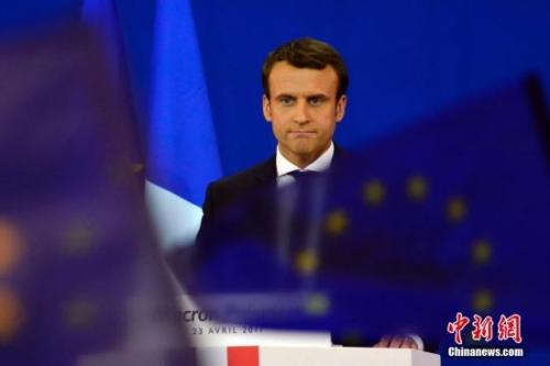 圖為馬克龍?jiān)趹c祝集會(huì)上。中新社記者 龍劍武 攝